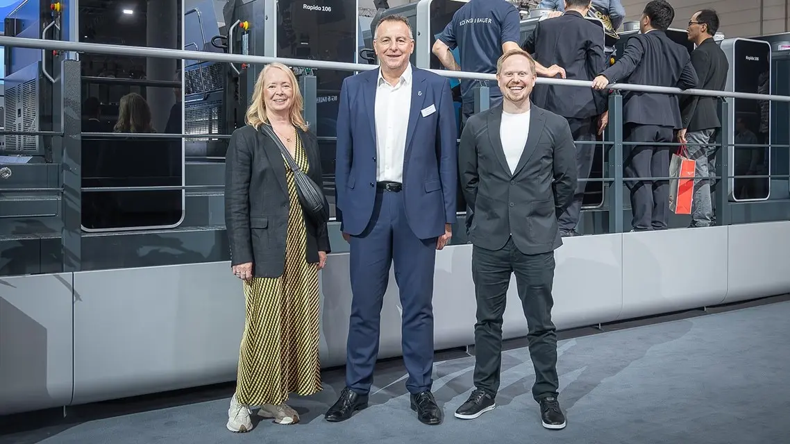 Photo 1: Lisa Smith, Chris Scully and Marcus Short in front of Rapida 106 X